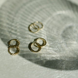 10k Solid Gold Prong CZ Huggie - - Earrings - Ofina