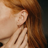 10k Solid Gold Croissant Huggie Studs - - Earrings - Ofina
